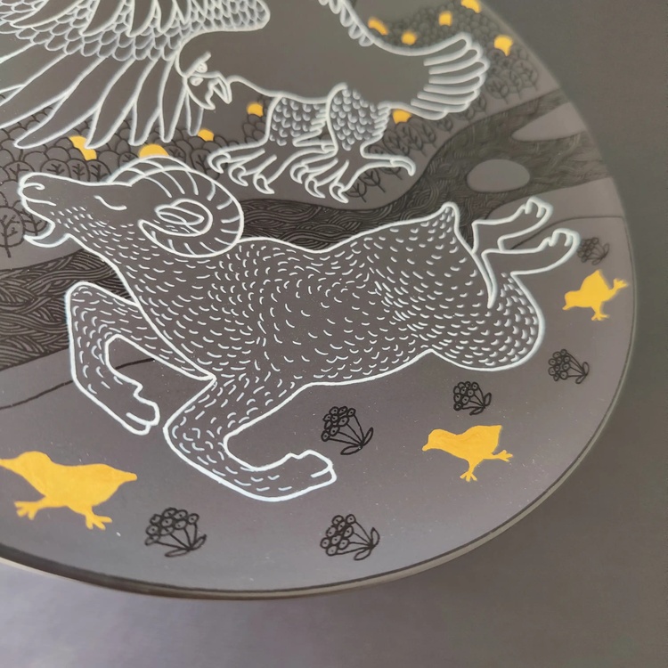 Decorative ceramic plate "Mountain ram and eagle" from the series "The Chase"