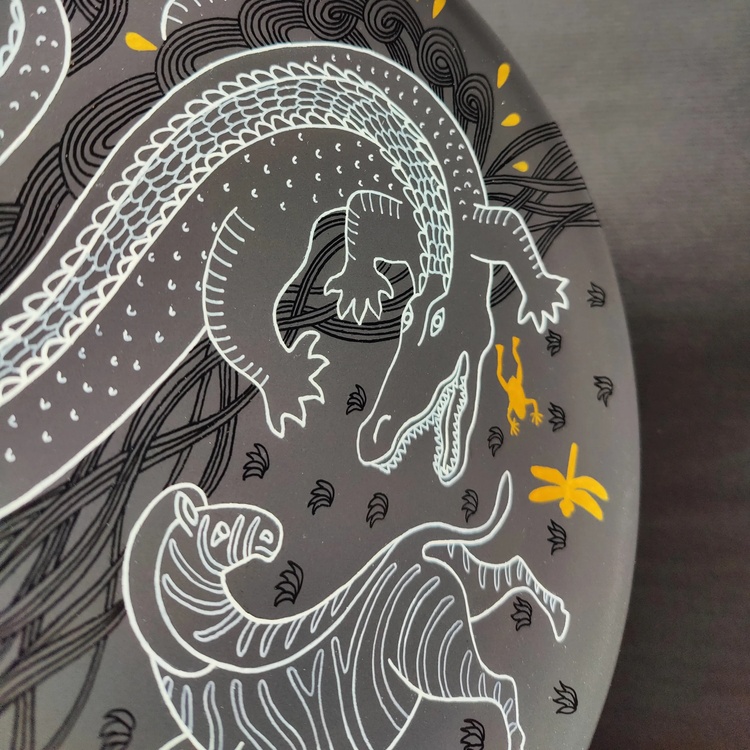 Decorative ceramic plate "Crocodile and Zebra" from the series "The Chase"