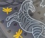 Decorative ceramic plate "Crocodile and Zebra" from the series "The Chase"