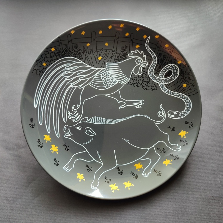 Decorative ceramic plate "Pig, Rooster, and Snake" from the series "The Chase"