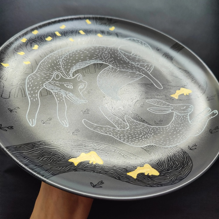 Decorative ceramic plate "Fox and Hare" from the series "The Chase".