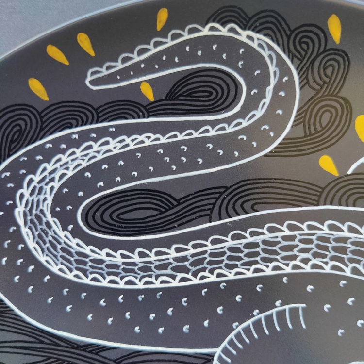 Decorative ceramic plate "Crocodile and Zebra" from the series "The Chase"