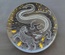 Decorative ceramic plate "Crocodile and Zebra" from the series "The Chase"