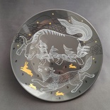 Decorative ceramic plate "Yak and Wolf" from the series "The Chase"