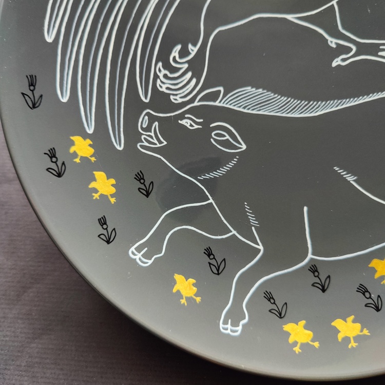 Decorative ceramic plate "Pig, Rooster, and Snake" from the series "The Chase"