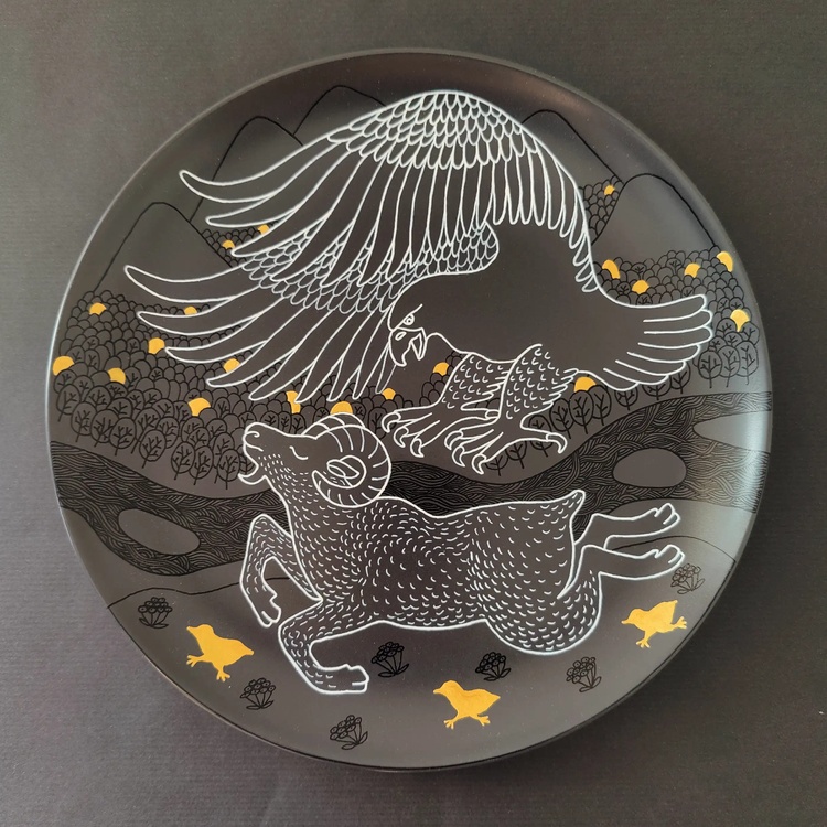 Decorative ceramic plate "Mountain ram and eagle" from the series "The Chase"