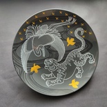 Decorative ceramic plate "Heron and Tiger" from the series "The Chase".