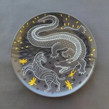 Decorative ceramic plate "Crocodile and Zebra" from the series "The Chase"