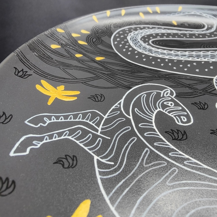 Decorative ceramic plate "Crocodile and Zebra" from the series "The Chase"